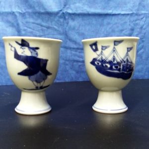 A pair of Japanese blue &white egg holders